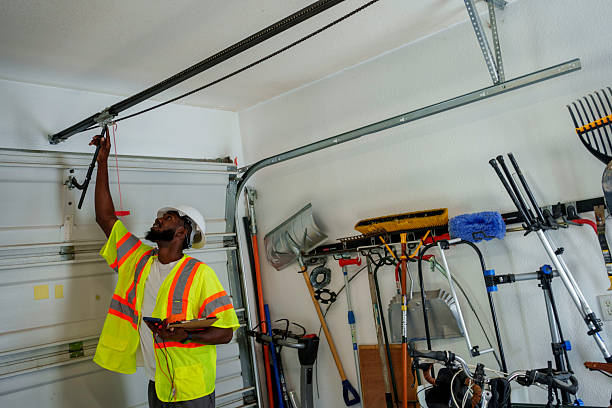 Professional Garage Door Panel Replacement technician working in East Baton Rouge Parish County, LA